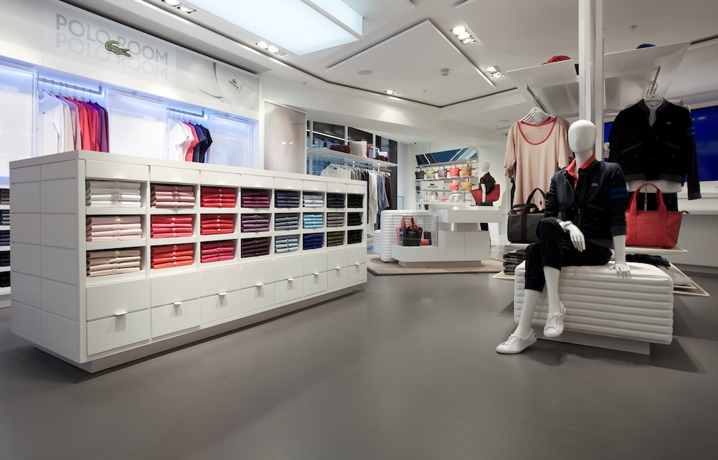 Grey anti-slip resin floor in a Lacoste store