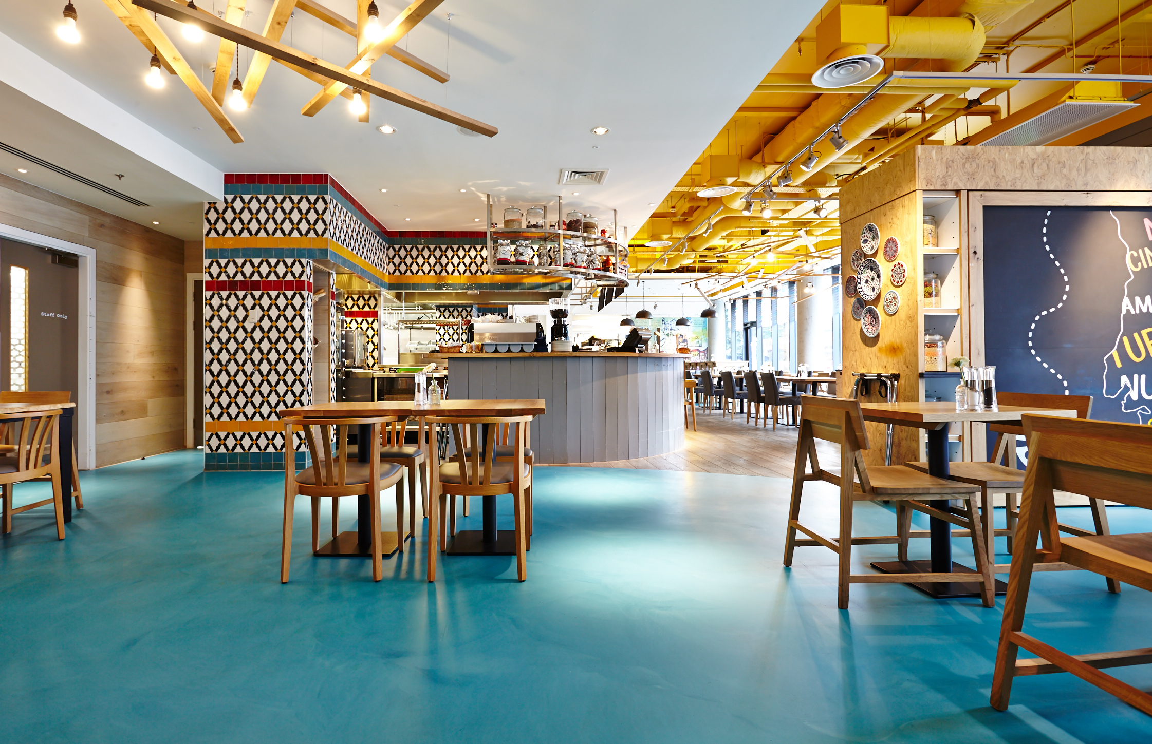 Blue anti-slip resin floor in a Hilton restaurant 