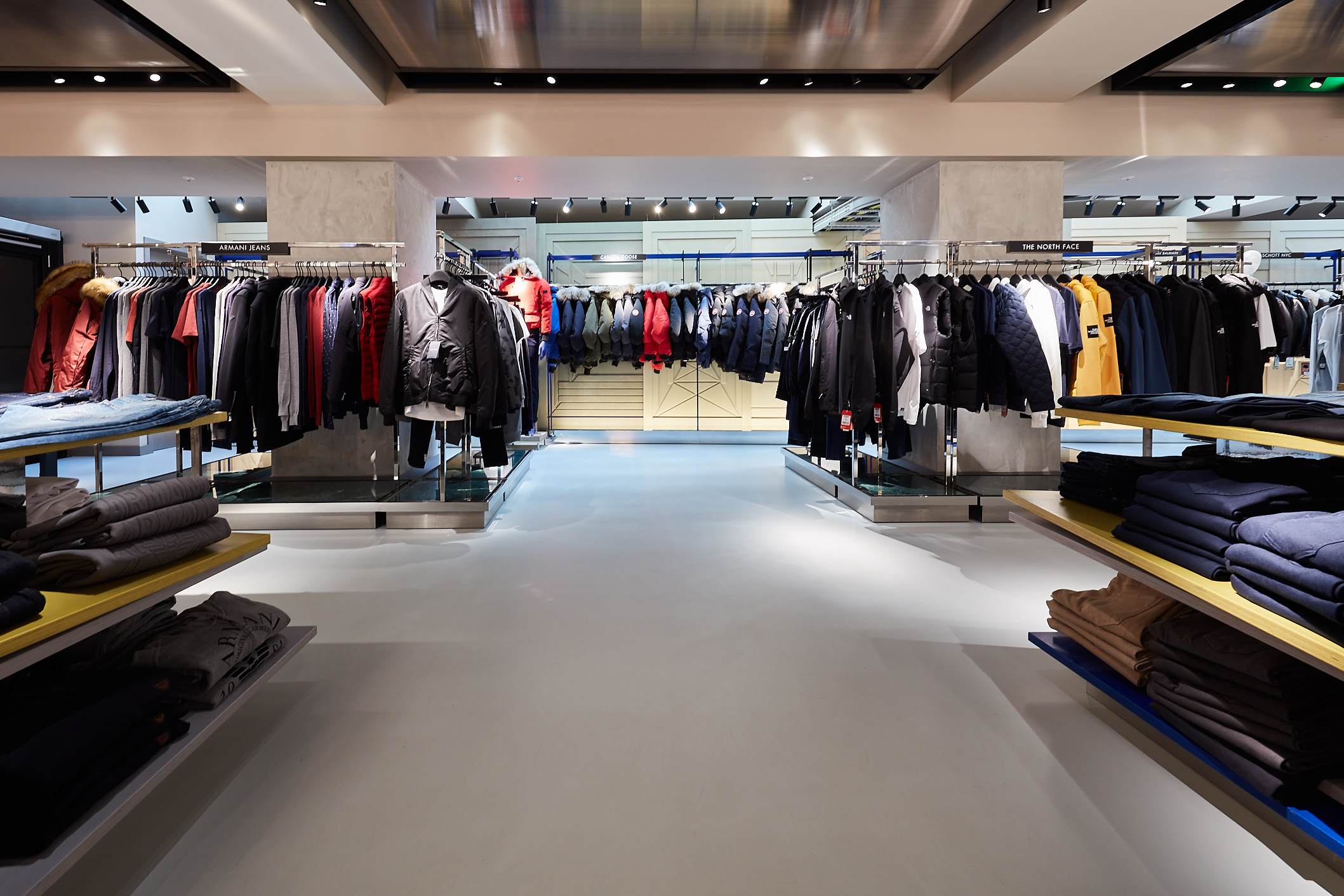 Grey resin retail flooring in clothes store