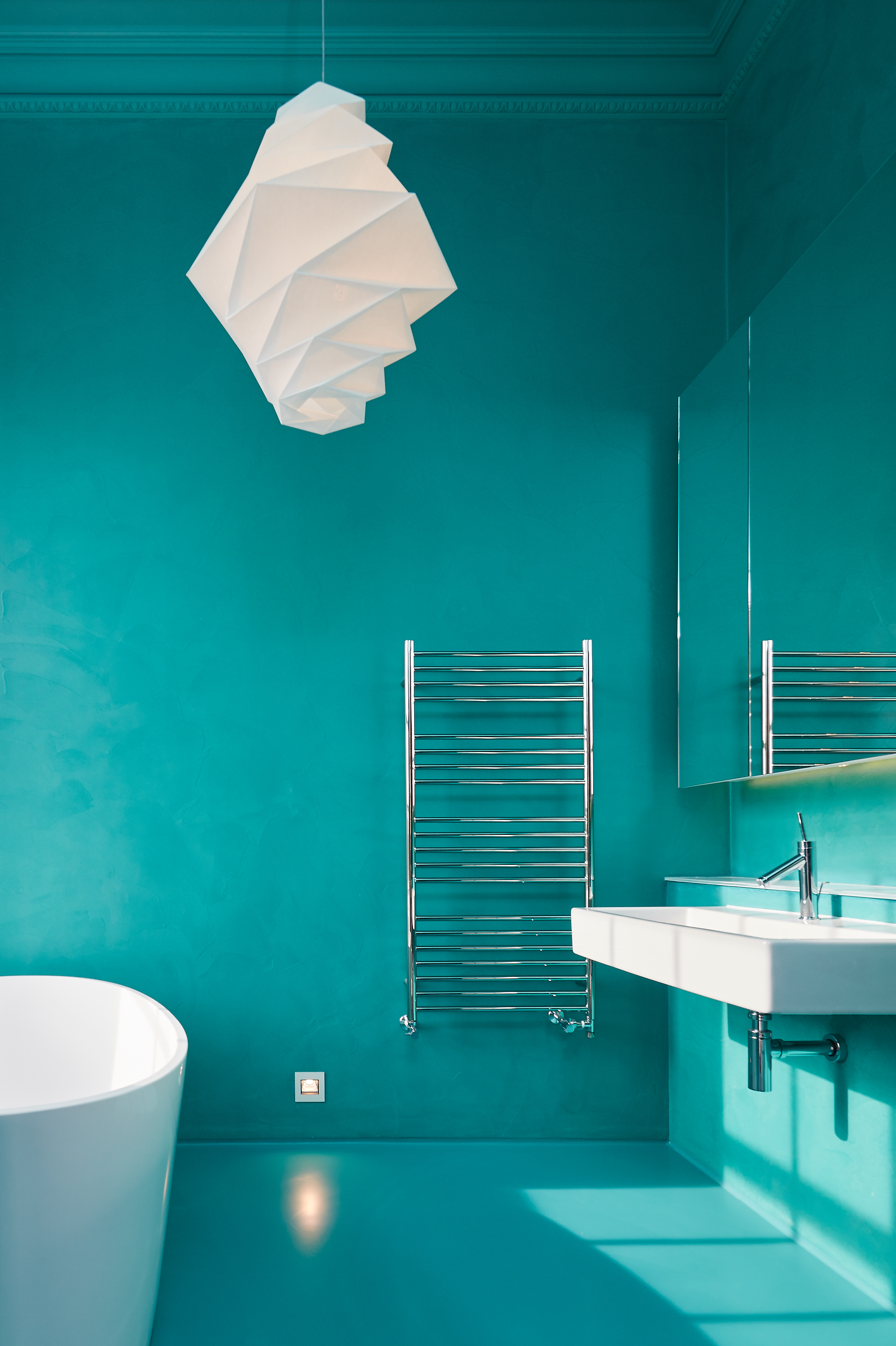 Turquoise matching bathroom resin wall finish and floor