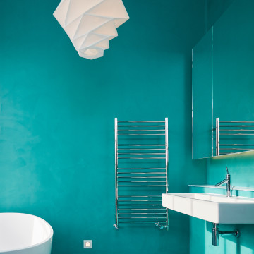 Turquoise matching bathroom resin wall finish and floor