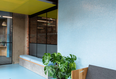 Blue resin floor for student accommodation, with light blue walls