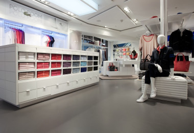 Grey anti-slip resin floor in a Lacoste store