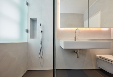 White and dark grey bathroom resin wall finish and floor 