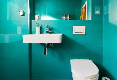 Turquoise matching bathroom resin wall finish and floor