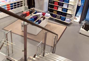 Grey resin retail floor in clothes store