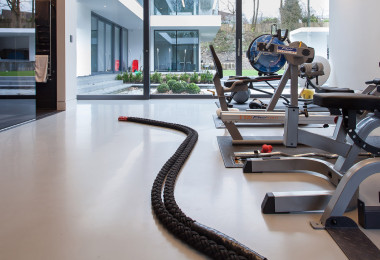 Very light grey resin HealthSphere floor in a gym