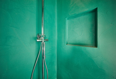 Turquoise resin bathroom wall finish