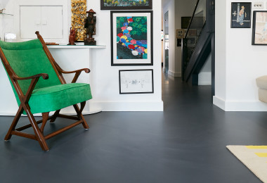 Dark grey motion resin residential flooring in living room