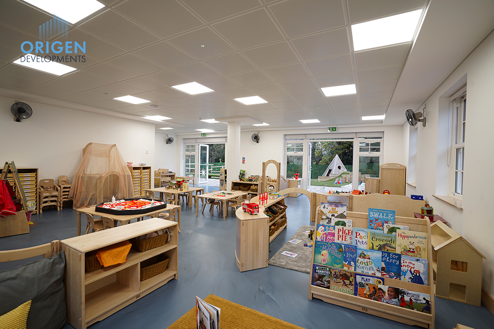 Dark blue resin HealthSphere floor with wooden cabinets