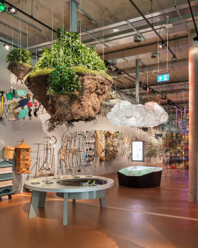 Orange-brown resin museum flooring with exhibitions on the walls and ceiling